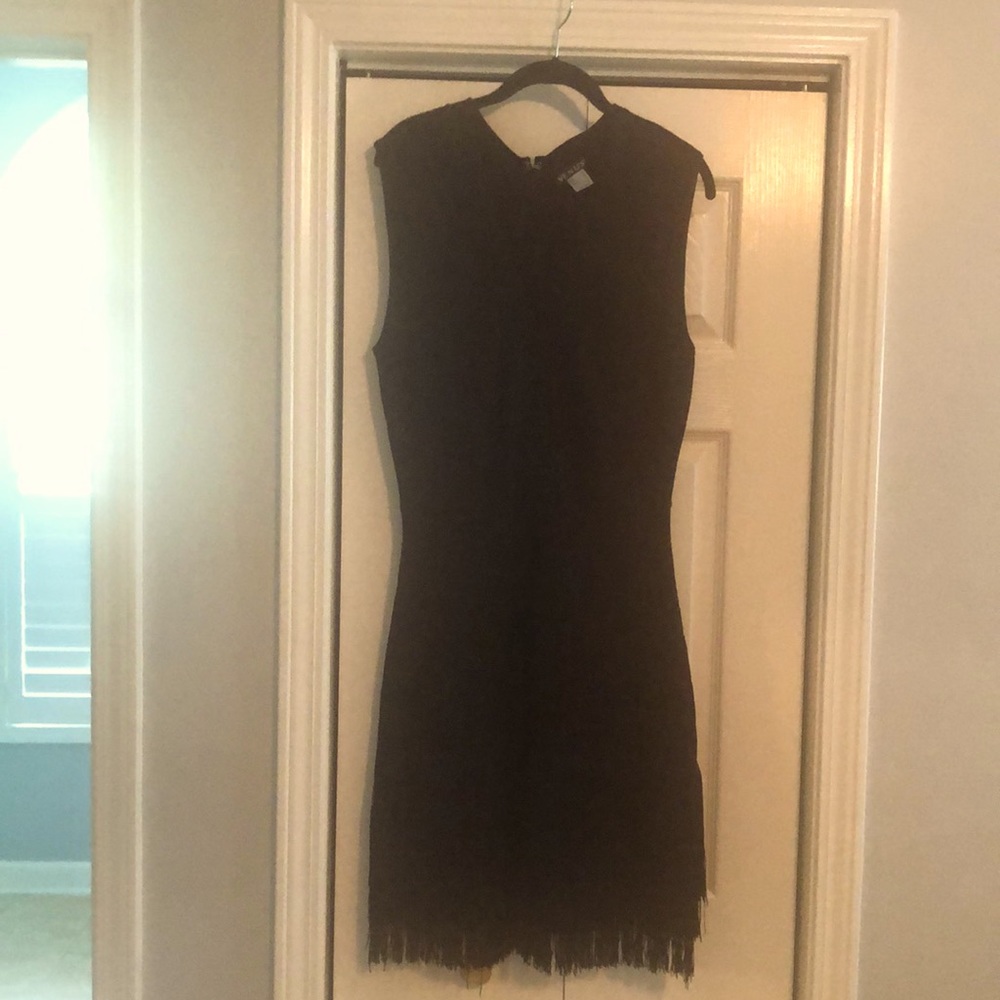Black fitted dress with fringe